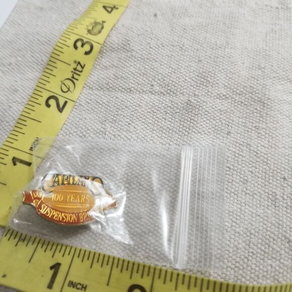 Capilano Suspension Bridge 100 years 1889-1989 vintage lapel pin 24 - Picture 1 of 3